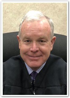 Judge Brock